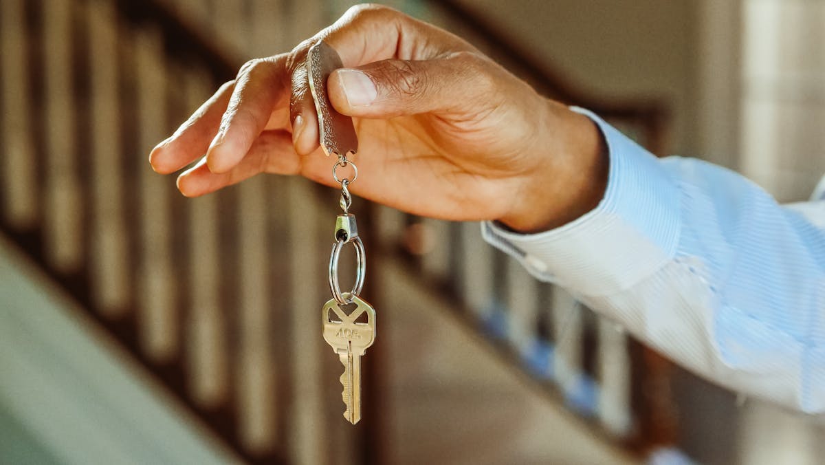A home key being handed over
